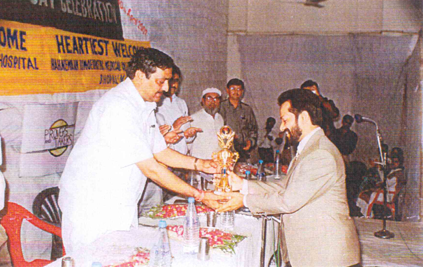 Receiving Knighthood of Homeopathy from the Corporation Minister, India
